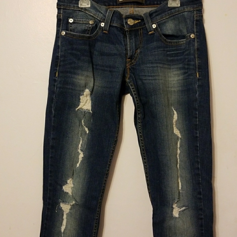 Levi's 524 Distressed Superlow Skinny Jeans