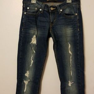 Levi's 524 Distressed Superlow Skinny Jeans