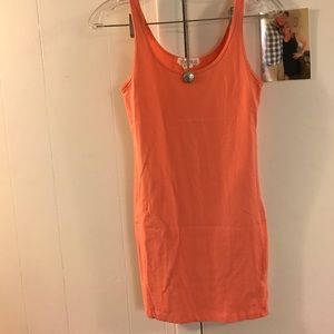 Simple coral colored form fitting dress