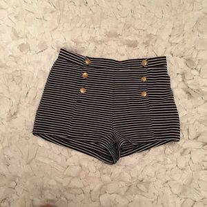 Striped shorts with gold buttons
