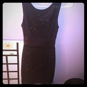 Tight black sparkley dress