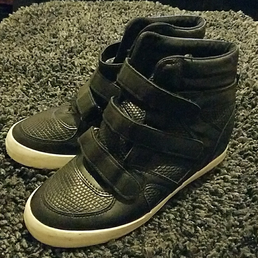 Black sneaker boots.