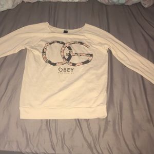 Beige obey sweater with floral lettering