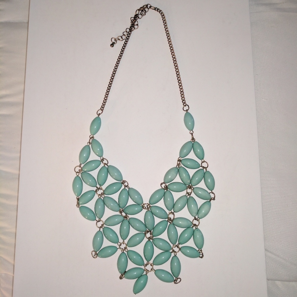 Turquoise colored chunky statement necklace