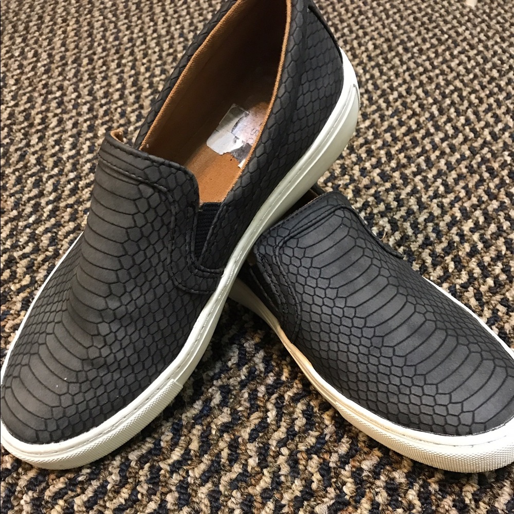 Grey slip ons
