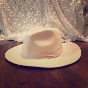 Cream colored brimmed hat