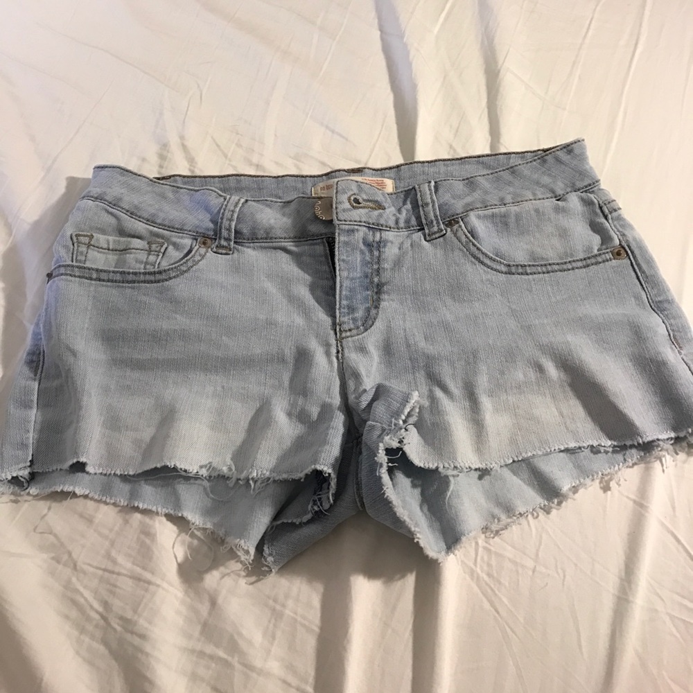 Light wash denim cut offs