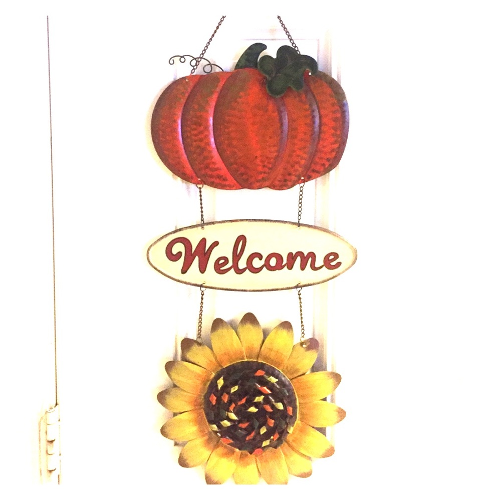 Adorable fall decor to accent your entrance.