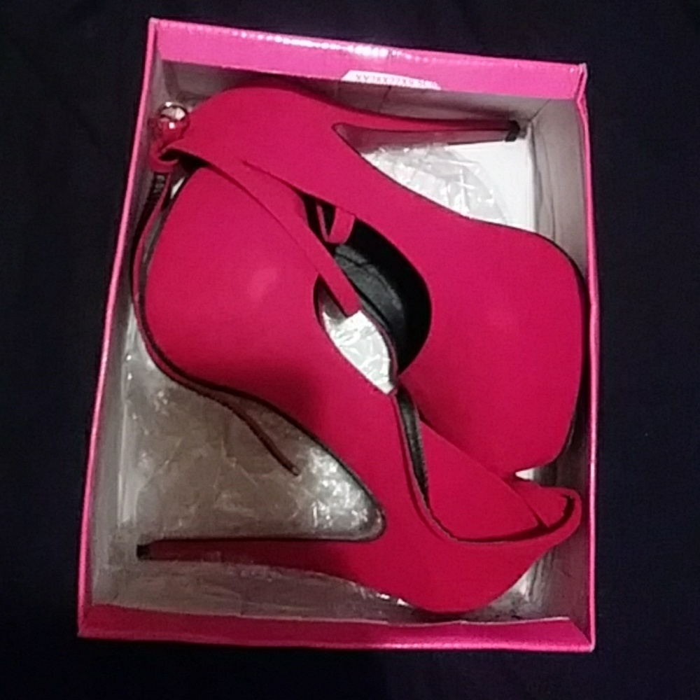 Red suede stiletto heels never worn