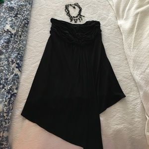 Strapless black top with choker necklace