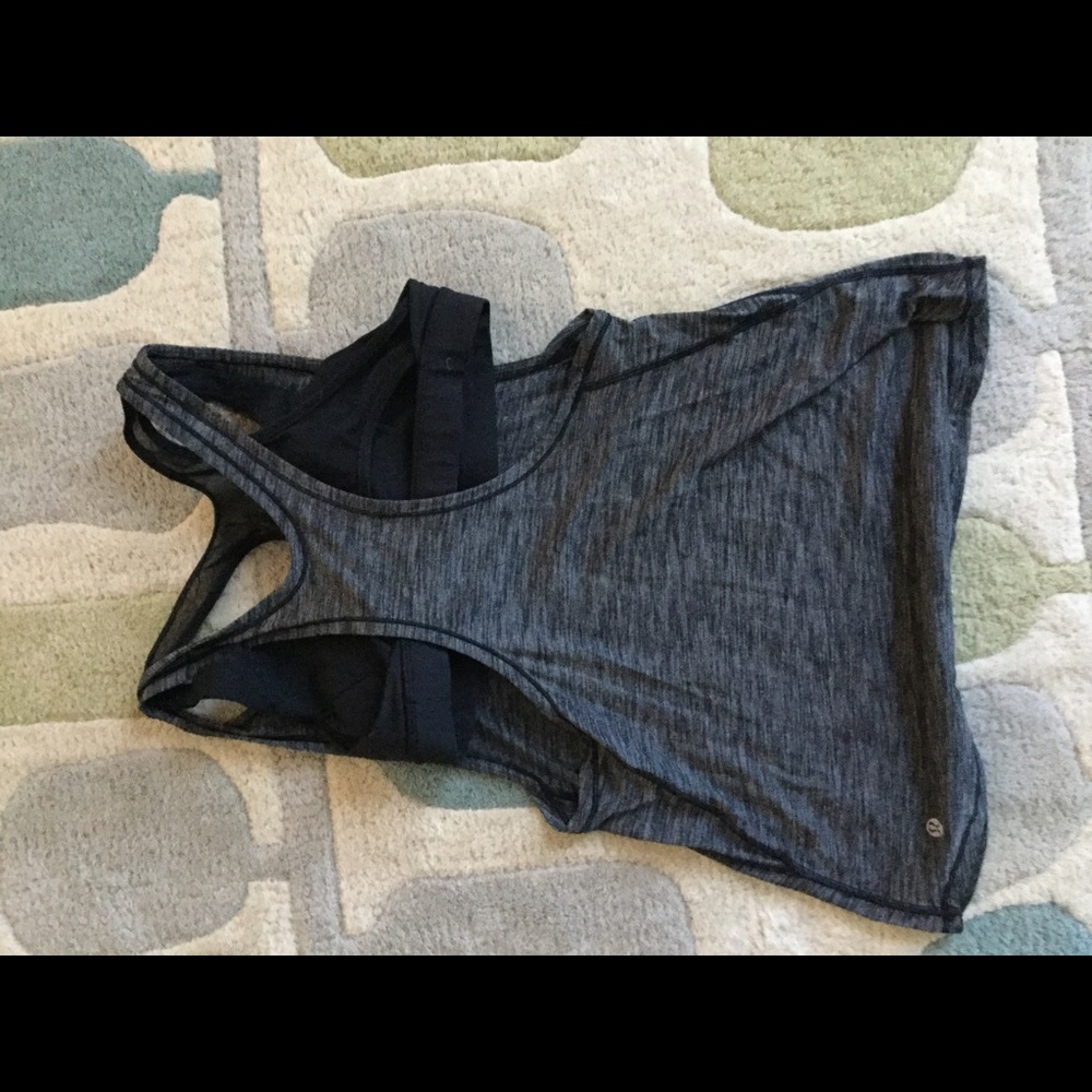 Lulu Lemon workout top, women once but too big