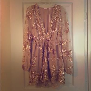 Gorgeous sequin romper NWT.