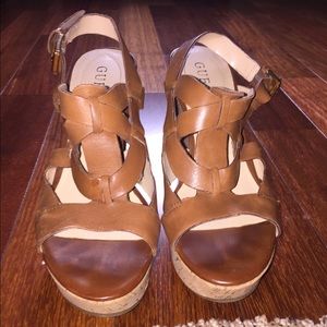 Brown guess heels. Worn once. Size 7.