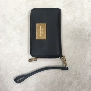 MICHAEL KORS black wristlet wallet. Lightly used.