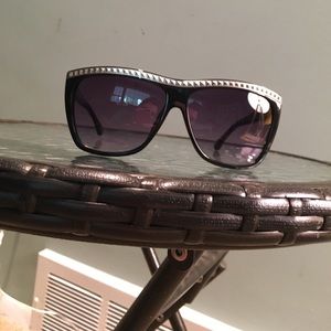 Micheal Khols wide frame sunglasses with studs