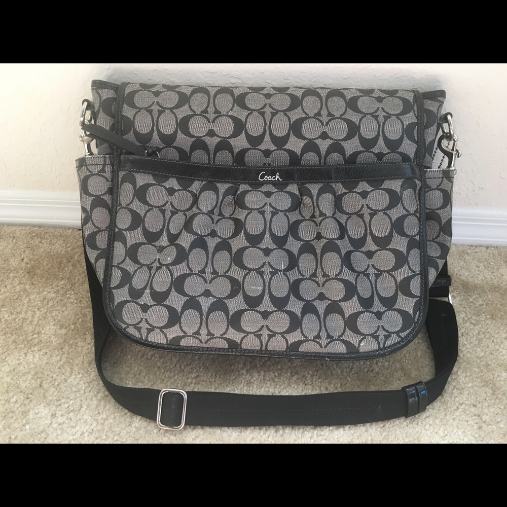 Black signature 100% Authentic Coach baby bag.