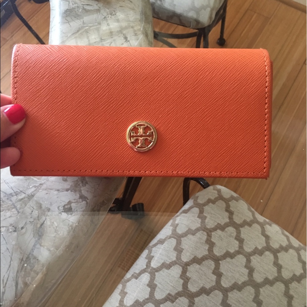 Tory Burch sunglasses case with cloth bag.