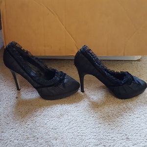 Black frilly heels