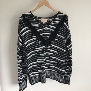 Brand new black and white sweater