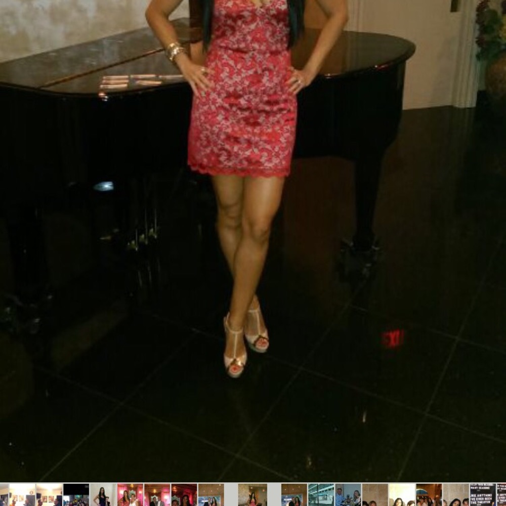 Flaunt your curves in this red/tan lace mini dress