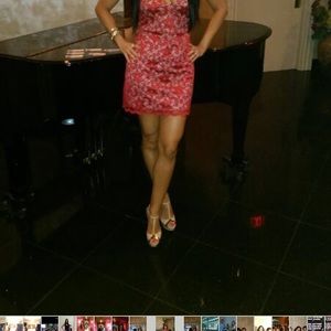 Flaunt your curves in this red/tan lace mini dress