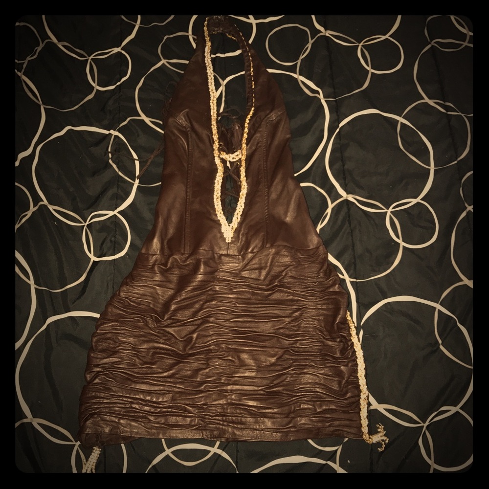 This custom dress was made By versailles Brooklyn.