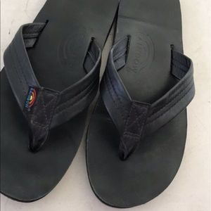 Black Rainbow flip flops