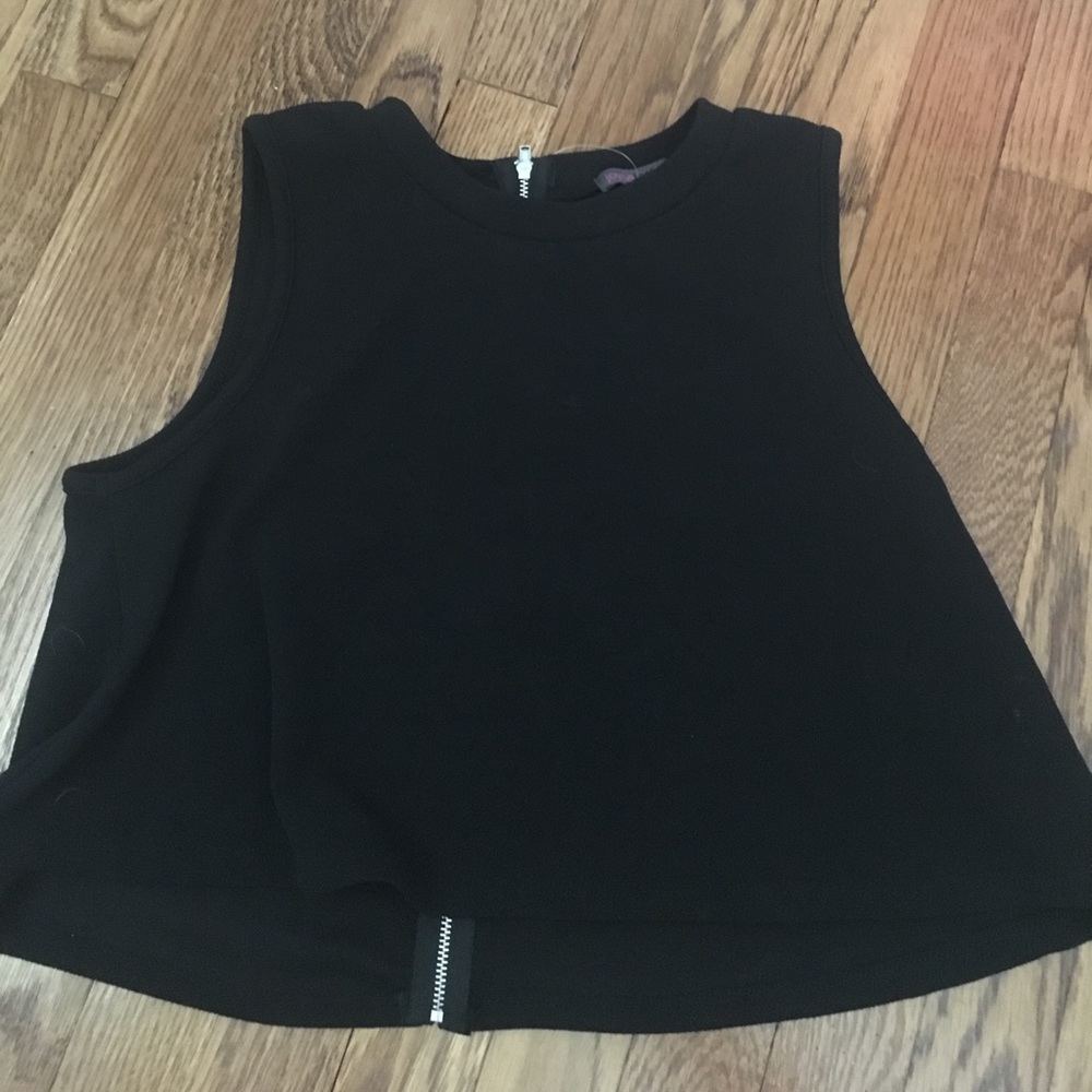 Black top with zipper up the back