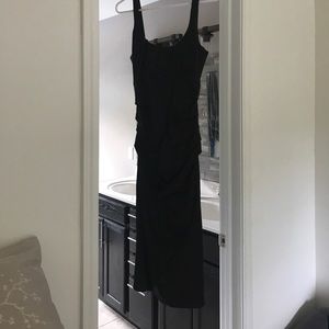 Black dress with lots of ruching. Worn once