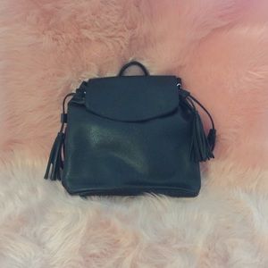 4 Tassel PU back pack