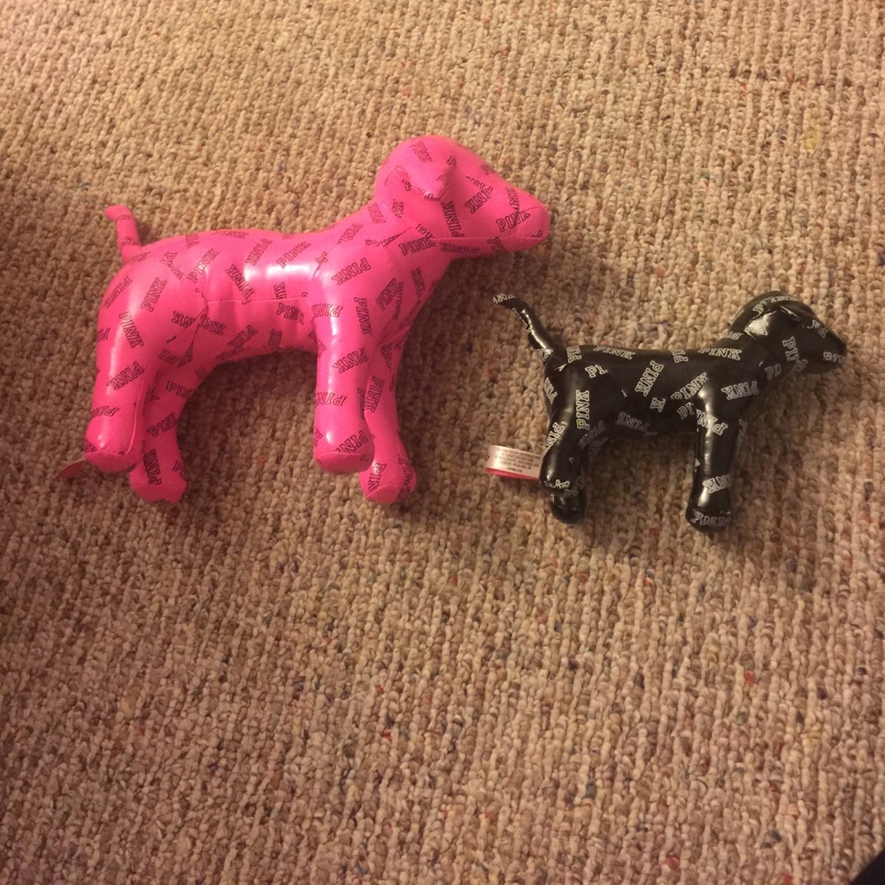 One large and one small pink dog