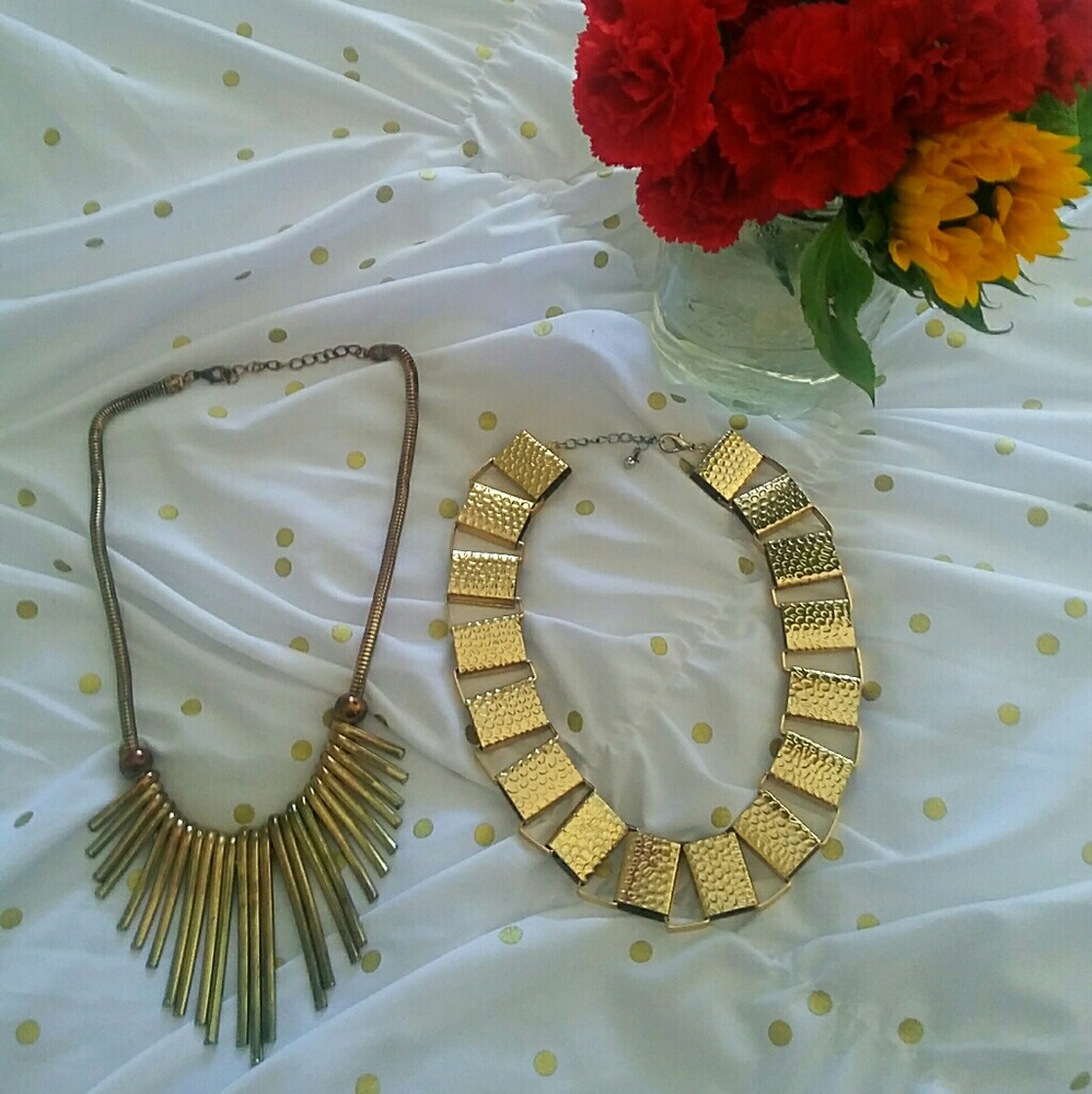 Gold colored statement piece necklaces
