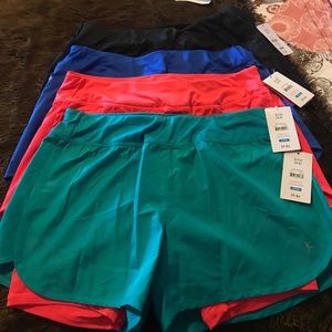 Several gym shorts with tights attached