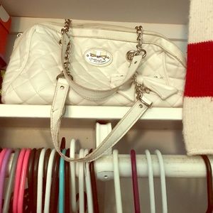 Really cute white and silver bag