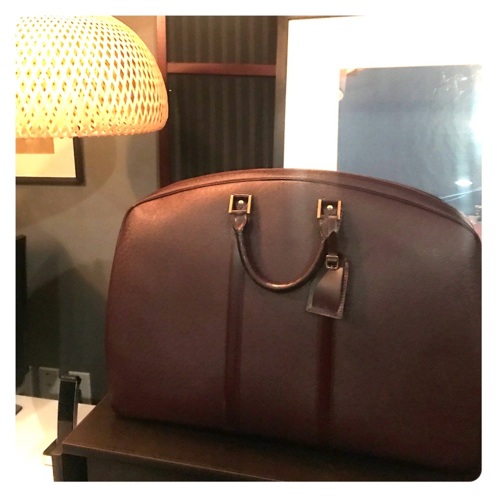 Louis Vuitton traveling leather garment bag