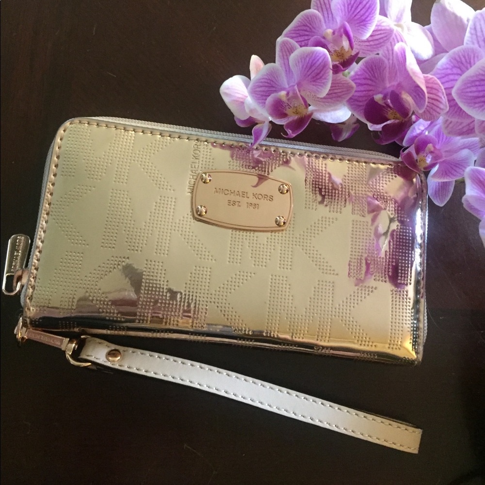 Rose gold Michael Kors cellphone wristlet