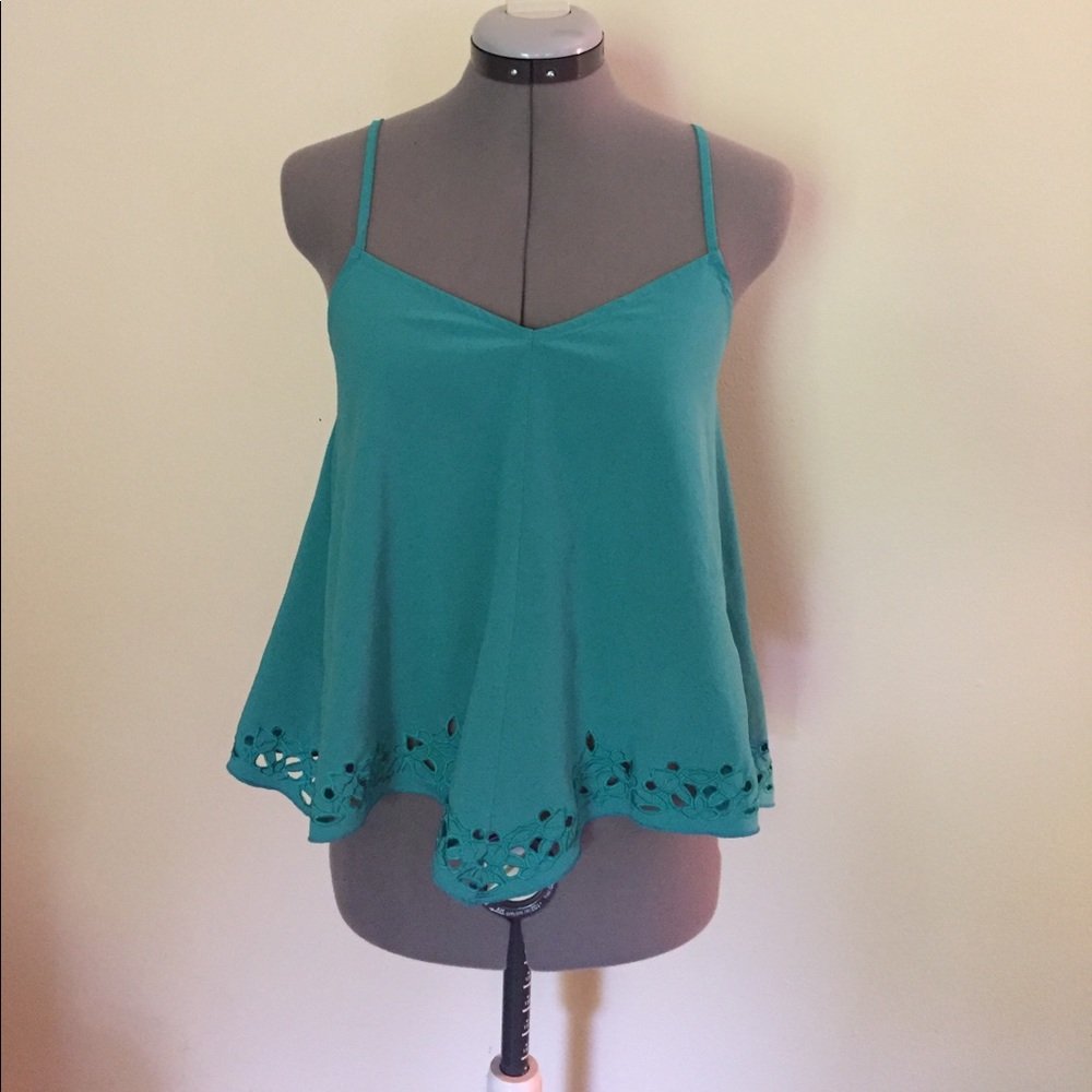 Fabletics teal top with cutout detail. XS