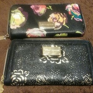Well loved Betsey Johnson zip around wallets