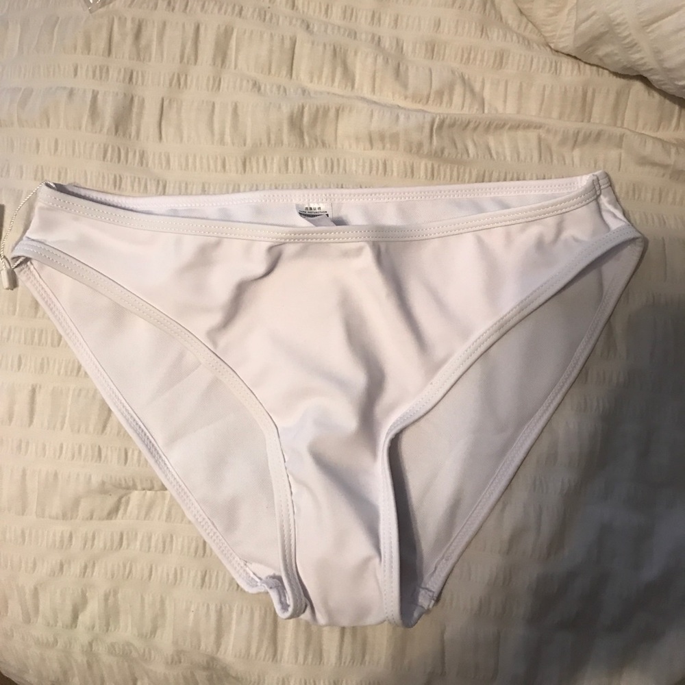 NWT & sanitary strip white bottoms