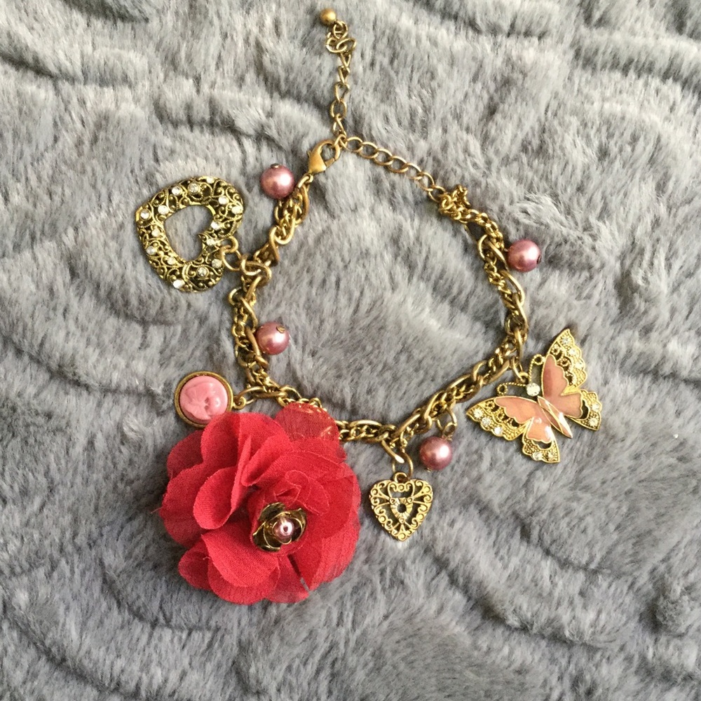 Closing Closet Sale! Gold tone charm bracelet