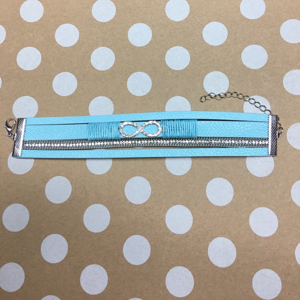 Baby blue leather infinity bracelet