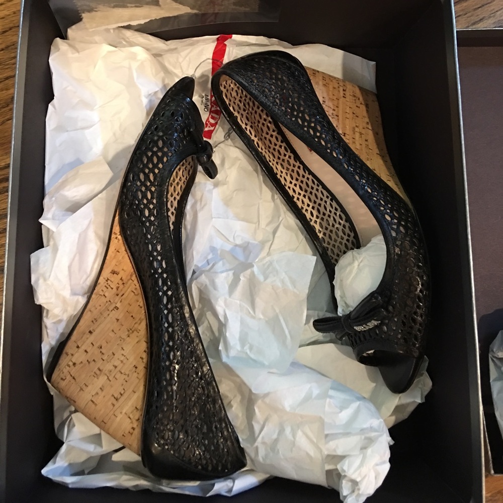 Black woven leather peep toe Prada wedges
