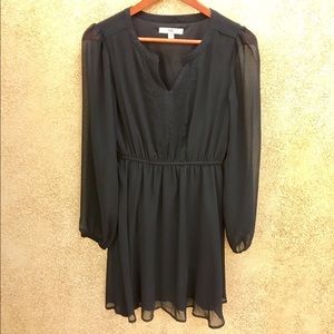 Ya Los Angeles Little Black Dress, sheer sleeves.
