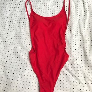 Red high leg one piece