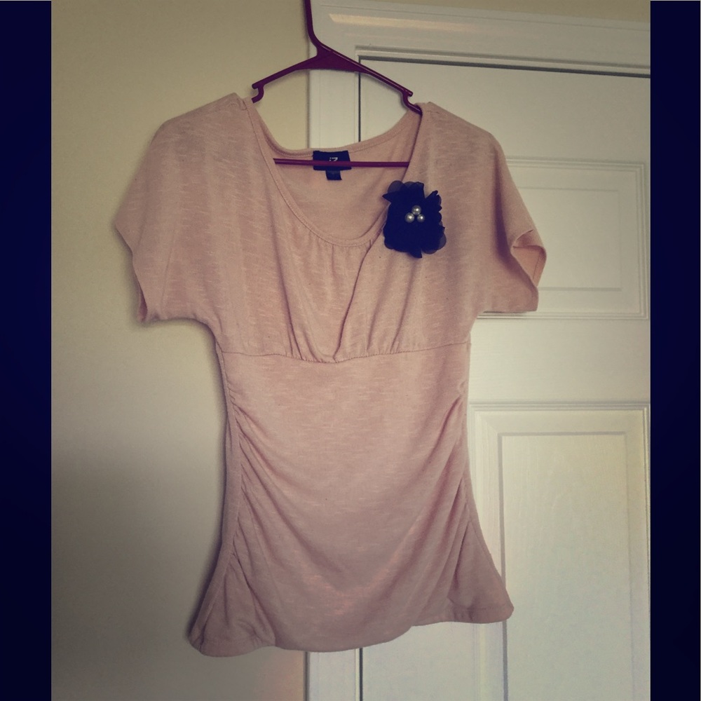 Pink blouse with flower