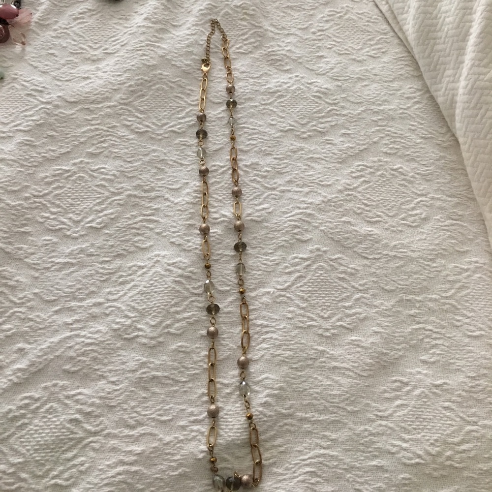 Long gold necklace