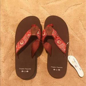 Douglas Paquette flip flops