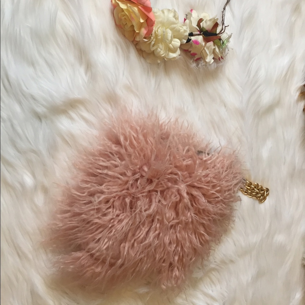 Fur pink purse. And flower 🌺 head band