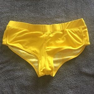 Yellow boy shorts swim bottoms
