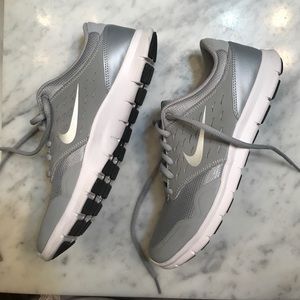 Women's size 8.5 Grey Nike trainers. Like NEW!
